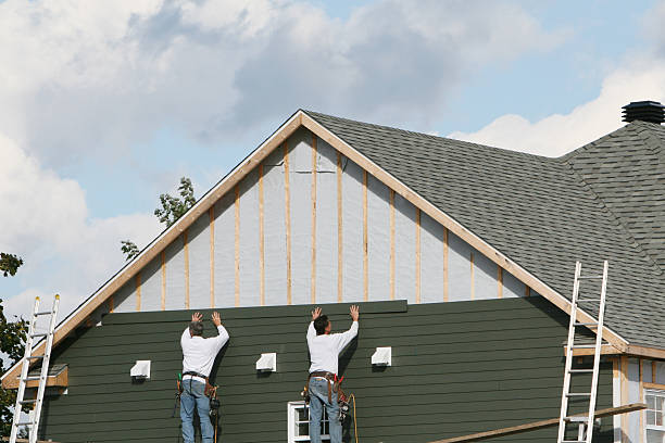 Professional Emergency Siding Repair technician working in Boxborough, MA